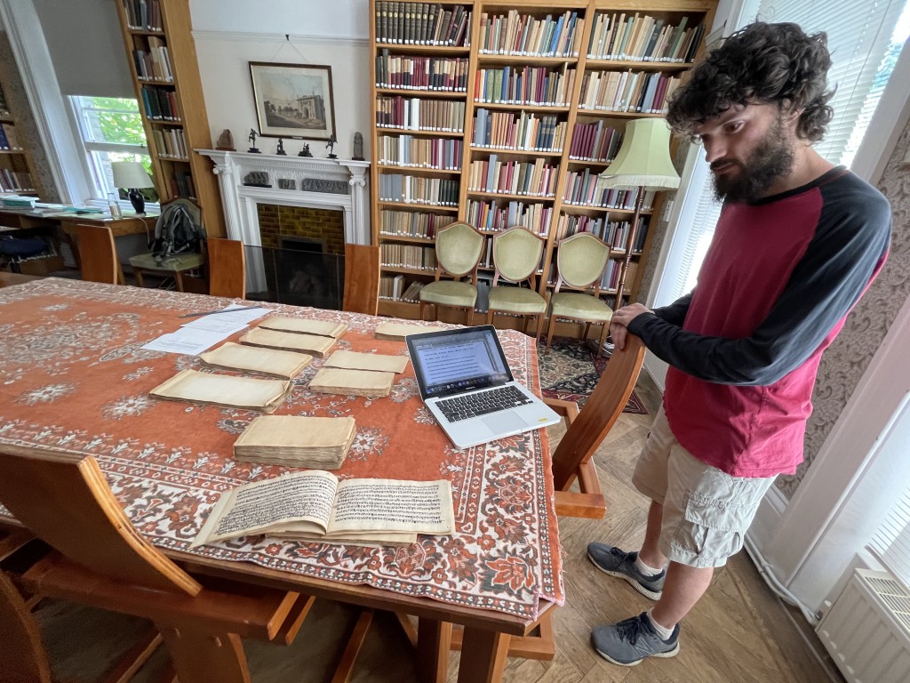 Examining the strangely bound Sanskrit manuscript at the AIIT with Dr. Daniel Sheridan